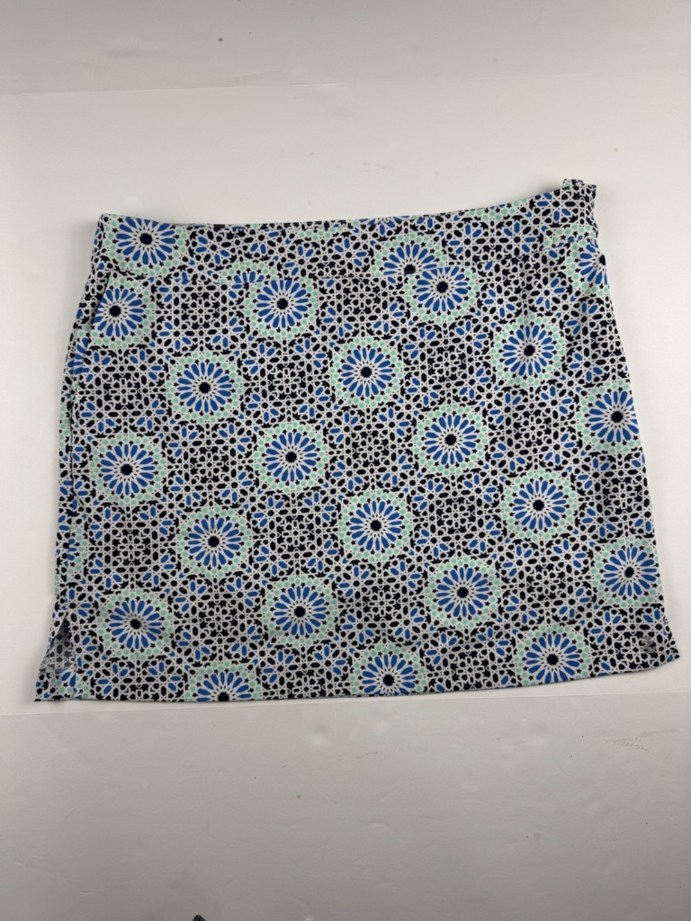 Izod Black and Blue Mosaic-Print golf mini skort